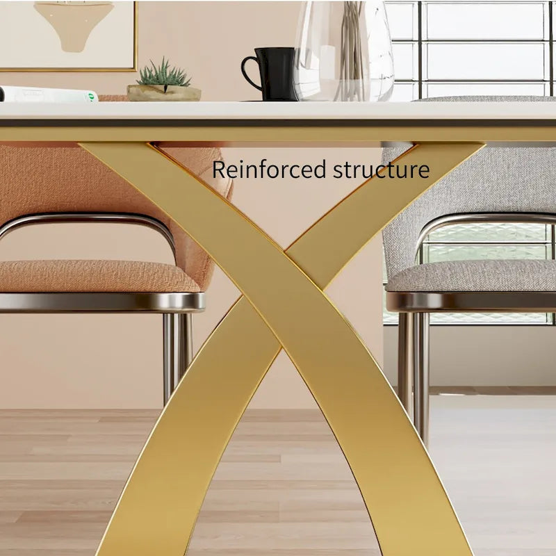 Table à manger rectangulaire avec plateau en pierre sintérisée et piètement en X doré