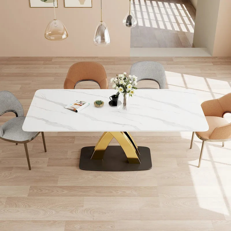 Table à manger rectangulaire avec plateau en pierre sintérisée et piètement en X doré